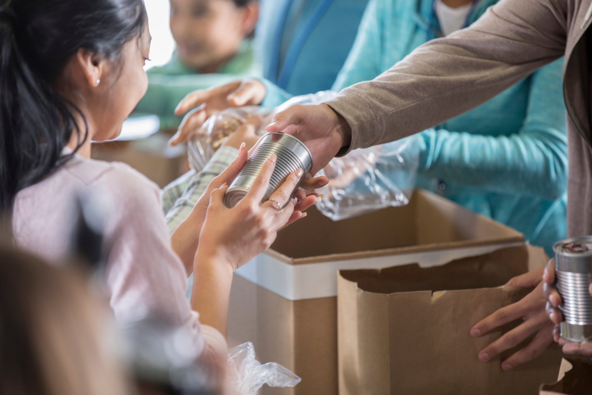 Woman receives food from local food bank